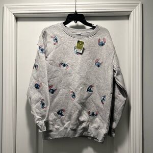 Disney, NWT embroidered Stitch sweatshirt. Size Large